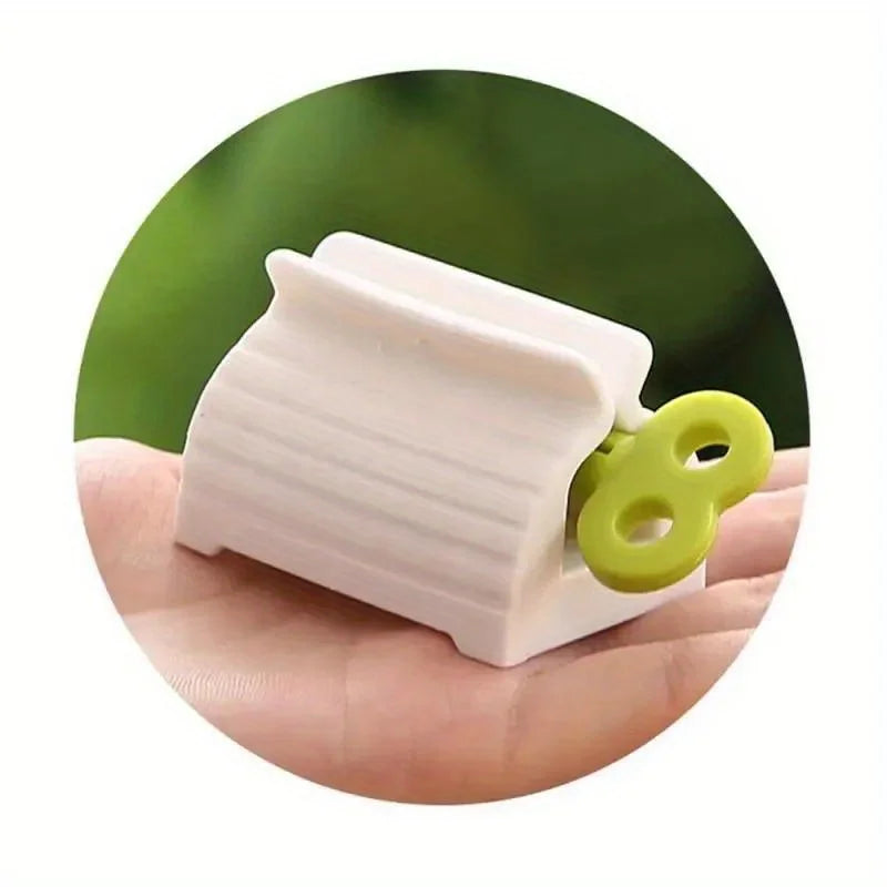1 exprimidor de pasta de dientes de tubo enrollable, soporte de asiento de pasta de dientes giratorio, dispensador de pasta de dientes para baño