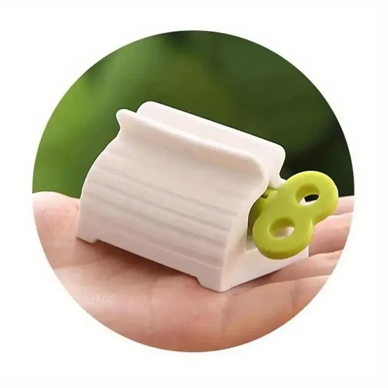 1 exprimidor de pasta de dientes de tubo enrollable, soporte de asiento de pasta de dientes giratorio, dispensador de pasta de dientes para baño